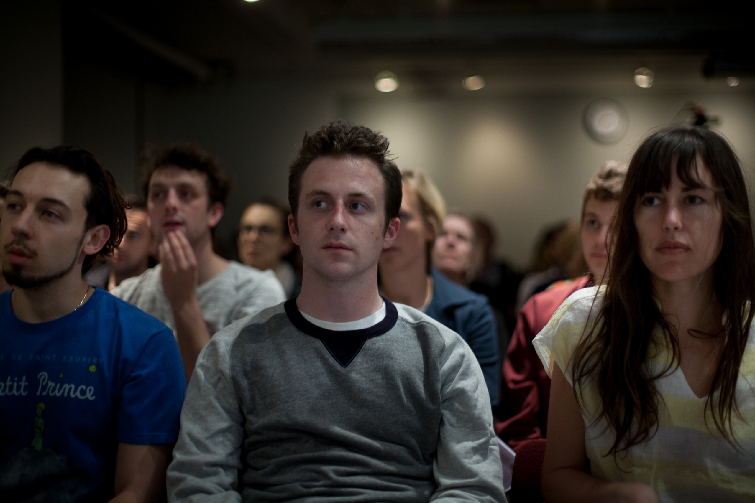 Audience members during the Intimate Lens presentations at ICP