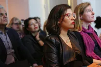 Photo of people sitting.