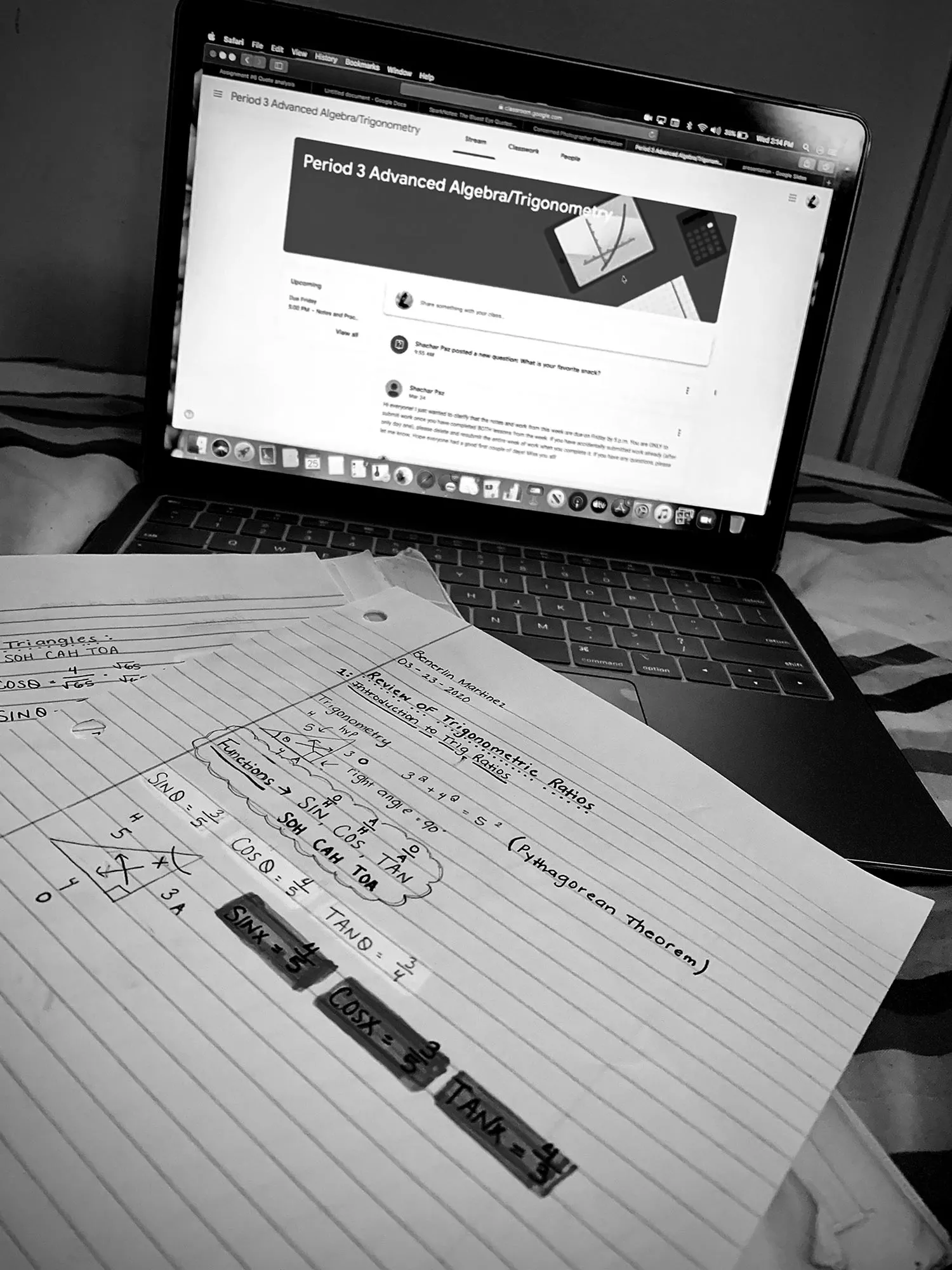 A picture of someone doing an online class.