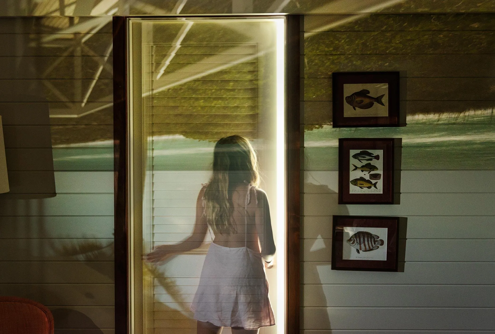 A girl going through the door.