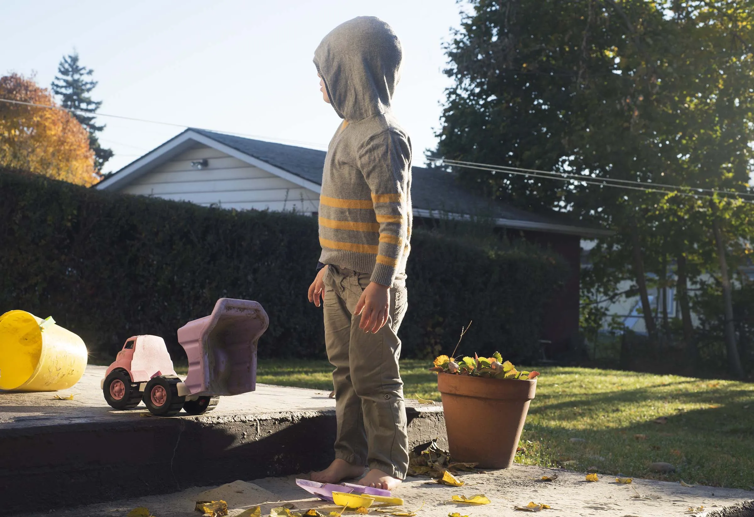 A kid playing outside.