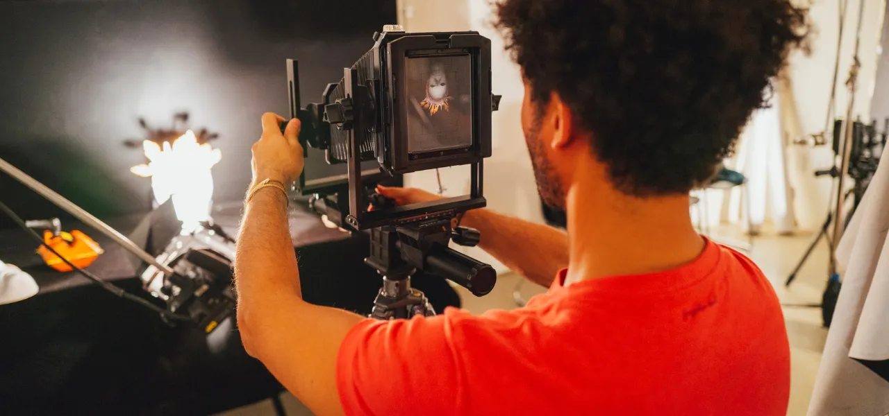 student using large format camera